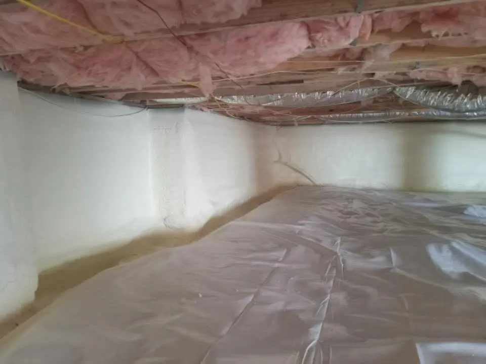 Crawl space encapsulation with closed-cell spray foam for Commercial Roof Restoration in Robinson